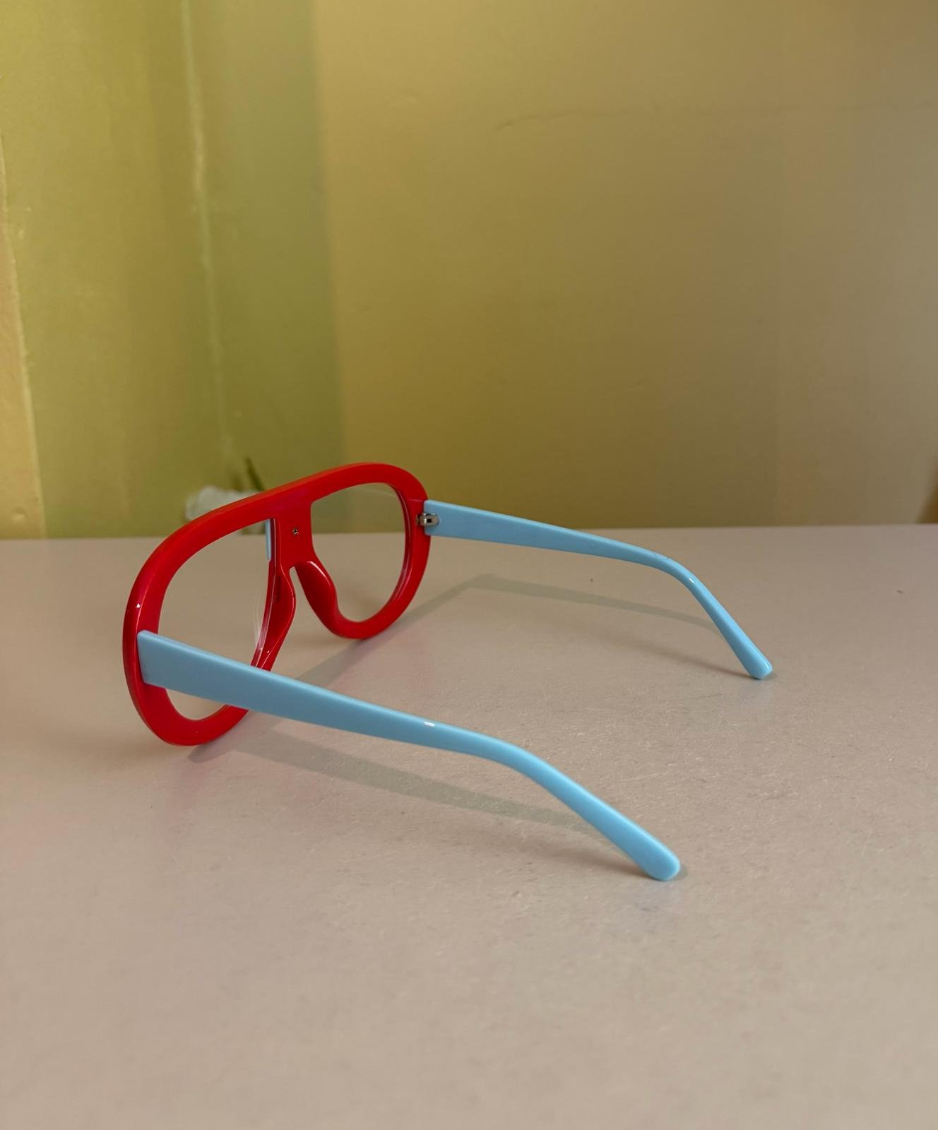 Bold Colour-Block Fashion Glasses – Red & Sky Blue (Clear Lens) - Image 2